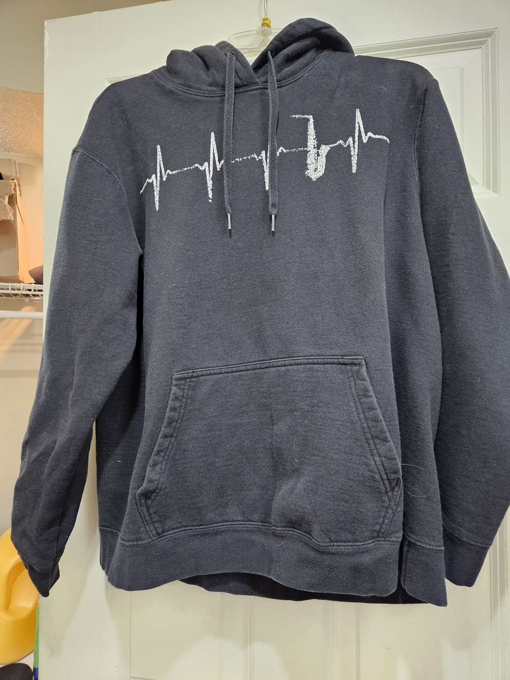 Men's Black Pullover Hoodie with Heartbeat Saxophone Graphic